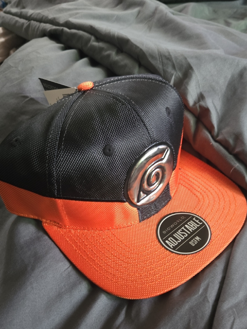 Hot Topic Black and Orange Snapback Hat with Metal Emblem